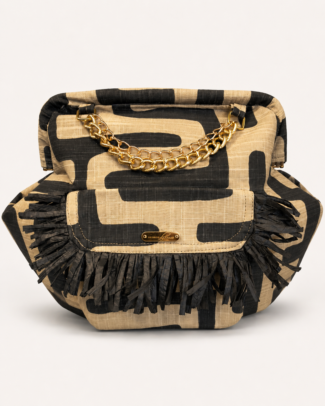 Tan and black handbag with fringe geo fringe bag